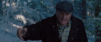 Movie still from “The Big Year” (2011), directed by David Frankel – An older man wearing a hat and a plaid jacket; Close Up shot, Low angle