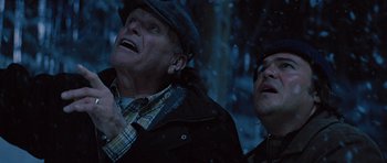 Movie still from “The Big Year” (2011), directed by David Frankel – Two men are looking up at the sky; Close Up shot, Low angle