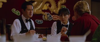 Movie still from “The Big Year” (2011), directed by David Frankel – A man and a woman sitting at a table eating food; Medium shot, Over the shoulder angle