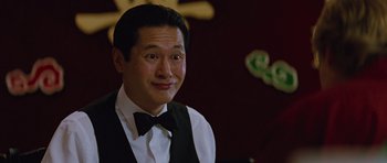 Movie still from “The Big Year” (2011), directed by David Frankel – A person wearing a bow tie; Close Up shot, Over the shoulder angle