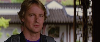 Movie still from “The Big Year” (2011), directed by David Frankel – A person wearing a blue shirt; Close Up shot, Over the shoulder angle