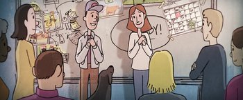 Movie still from “The Biggest Little Farm” (2018), directed by John Chester – Two people standing next to each other in front of a dog; Medium shot, High angle