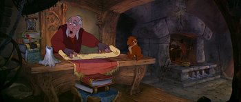 Movie still from “The Black Cauldron” (1985), directed by Ted Berman – An old man and a little bear in a room with books; Medium shot, Low angle