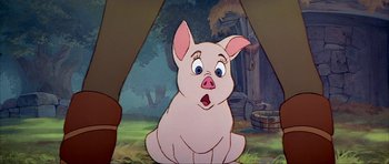 Movie still from “The Black Cauldron” (1985), directed by Ted Berman – A cartoon pig sitting in front of a tree; Close Up shot, High angle