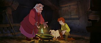 Movie still from “The Black Cauldron” (1985), directed by Ted Berman – A group of people that are standing around a pot; Medium shot, Low angle
