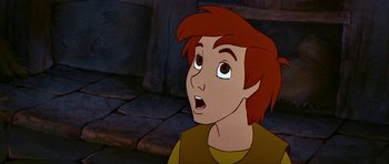 Movie still from “The Black Cauldron” (1985), directed by Ted Berman – A young boy with a surprised look on his face; Close Up shot, Low angle