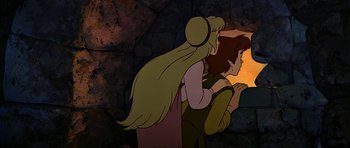 Movie still from “The Black Cauldron” (1985), directed by Ted Berman – A couple of people standing next to each other in a cave; Medium shot, High angle