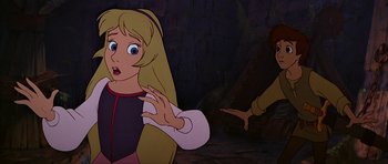 Movie still from “The Black Cauldron” (1985), directed by Ted Berman – A young blonde haired girl is looking surprised at a young man; Medium shot, Over the shoulder angle