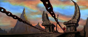 Movie still from “The Black Cauldron” (1985), directed by Ted Berman – An image of an animated scene with a mountain and a tree in the background; Extreme Wide shot, Low angle