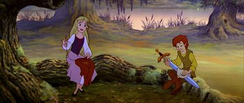 Movie still from “The Black Cauldron” (1985), directed by Ted Berman – A painting of a woman and a man holding a sword in a forest; Wide shot, Over the shoulder angle