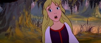Movie still from “The Black Cauldron” (1985), directed by Ted Berman – A woman with long blonde hair is looking surprised; Close Up shot, Low angle