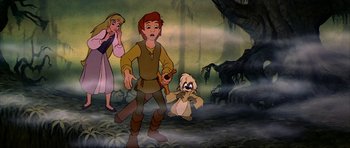 Movie still from “The Black Cauldron” (1985), directed by Ted Berman – A group of people standing next to each other in a forest; Medium shot, Low angle