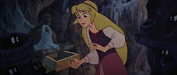 Movie still from “The Black Cauldron” (1985), directed by Ted Berman – A woman in a dress is looking at a box; Medium shot, High angle