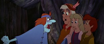 Movie still from “The Black Cauldron” (1985), directed by Ted Berman – A group of people standing next to each other in a cave; Close Up shot, Over the shoulder angle