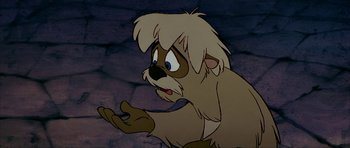 Movie still from “The Black Cauldron” (1985), directed by Ted Berman – A cartoon character with white fur; Close Up shot, Over the shoulder angle