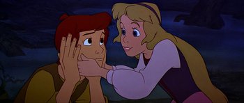 Movie still from “The Black Cauldron” (1985), directed by Ted Berman – A woman touching the cheek of a young boy; Close Up shot, High angle