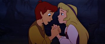 Movie still from “The Black Cauldron” (1985), directed by Ted Berman – A couple of people that are looking at one another; Close Up shot, Overhead angle