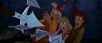Movie still from “The Black Cauldron” (1985), directed by Ted Berman – A couple of people that are in a cartoon; Medium shot, Low angle