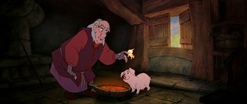Movie still from “The Black Cauldron” (1985), directed by Ted Berman – An old man and a pig in a barn; Medium shot, High angle