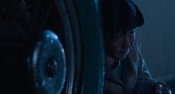 Movie still from “The Black Stallion” (1979), directed by Carroll Ballard – A man is looking out of the window of an airplane at night; Close Up shot, Low angle