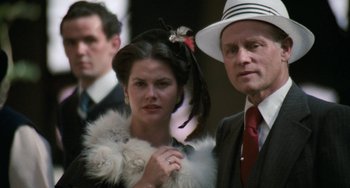 Movie still from “The Black Stallion” (1979), directed by Carroll Ballard – A man and a woman standing next to each other; Close Up shot, Low angle