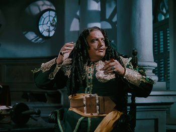 Movie still from “The Black Swan” (1942), directed by Henry King – A man with dreadlocks is dressed as a pirate; Medium shot, High angle