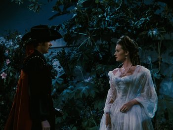 Movie still from “The Black Swan” (1942), directed by Henry King – A man and a woman dressed in medieval clothing; Medium shot, High angle