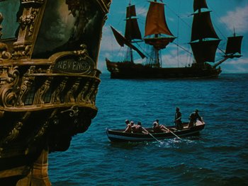 Movie still from “The Black Swan” (1942), directed by Henry King – A group of people in a boat on a body of water; Extreme Wide shot, High angle