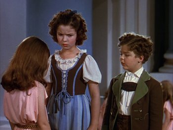 Movie still from “The Blue Bird” (1940), directed by Walter Lang – A group of children standing next to each other; Medium shot, Low angle