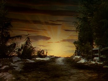 Movie still from “The Blue Bird” (1940), directed by Walter Lang – The sun is setting over a snowy field; Extreme Wide shot, Low angle