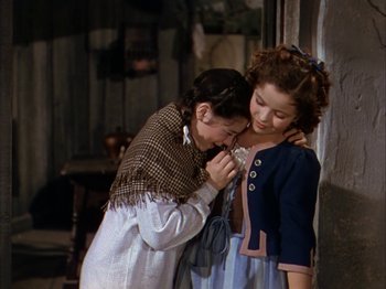 Movie still from “The Blue Bird” (1940), directed by Walter Lang – Two girls are standing next to each other; Medium shot, High angle