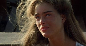 Movie still from “The Blue Lagoon” (1980), directed by Randal Kleiser – A woman's face in the sunlight; Close Up shot, Over the shoulder angle