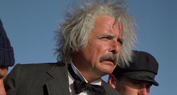 Movie still from “The Blue Lagoon” (1980), directed by Randal Kleiser – An older man with a white hair and a mustache; Close Up shot, Low angle