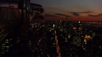 Movie still from “The Bonfire of the Vanities” (1990), directed by Brian De Palma – A view of a city at night from the top of a building; Extreme Wide shot, High angle
