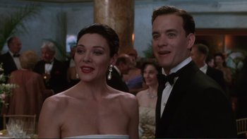 Movie still from “The Bonfire of the Vanities” (1990), directed by Brian De Palma – A man and a woman standing next to each other; Close Up shot, Low angle