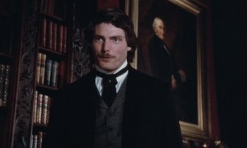 Movie still from “The Bostonians” (1984), directed by James Ivory – A man standing in front of a painting of himself; Close Up shot, Low angle