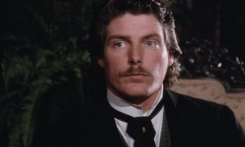 Movie still from “The Bostonians” (1984), directed by James Ivory – A person wearing a suit and tie; Close Up shot, Low angle