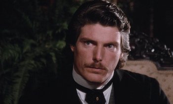 Movie still from “The Bostonians” (1984), directed by James Ivory – A person wearing a suit and tie; Close Up shot, Over the shoulder angle