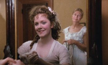 Movie still from “The Bostonians” (1984), directed by James Ivory – A woman and a young girl in a room; Close Up shot, Over the shoulder angle