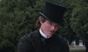 Movie still from “The Bostonians” (1984), directed by James Ivory – A person wearing a top hat; Close Up shot, Low angle