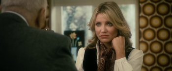 Movie still from “The Box” (2009), directed by Richard Kelly – A person wearing a neck tie; Close Up shot, Over the shoulder angle