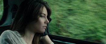 Movie still from “The Boy” (2016), directed by William Brent Bell – A woman sitting in a car looking out the window; Close Up shot, Low angle