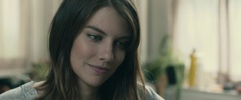 Movie still from “The Boy” (2016), directed by William Brent Bell – A person with long hair; Close Up shot, Over the shoulder angle