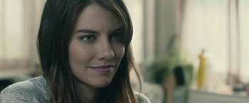 Movie still from “The Boy” (2016), directed by William Brent Bell – A woman with long hair; Close Up shot, Over the shoulder angle