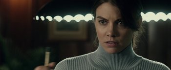 Movie still from “The Boy” (2016), directed by William Brent Bell – A person wearing a sweater; Close Up shot, Over the shoulder angle