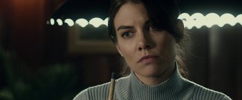 Movie still from “The Boy” (2016), directed by William Brent Bell – A person holding a pencil; Close Up shot, Over the shoulder angle