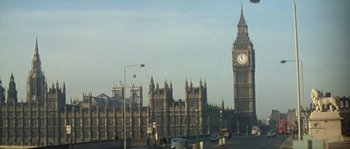 Movie still from “The Brain” (1969), directed by Gérard Oury – A view of big ben from across the street; Extreme Wide shot, Low angle
