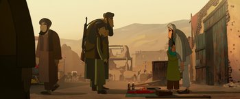 Movie still from “The Breadwinner” (2017), directed by Nora Twomey – A man standing next to a woman in a desert; Wide shot, Over the shoulder angle
