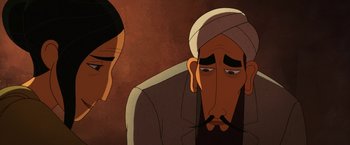 Movie still from “The Breadwinner” (2017), directed by Nora Twomey – A man with a beard and a turban is sitting next to another man with a beard; Close Up shot, Over the shoulder angle
