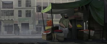 Movie still from “The Breadwinner” (2017), directed by Nora Twomey – A man standing in front of an outdoor fruit stand; Wide shot, Over the shoulder angle